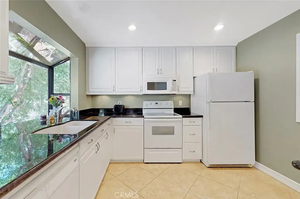 22226 Caminito Arroyo Seco 83 in Laguna Hills, sold by Wise Choices Realty.